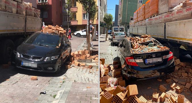İnşaata indirilen tuğlalar otomobilin üzerine devrildi